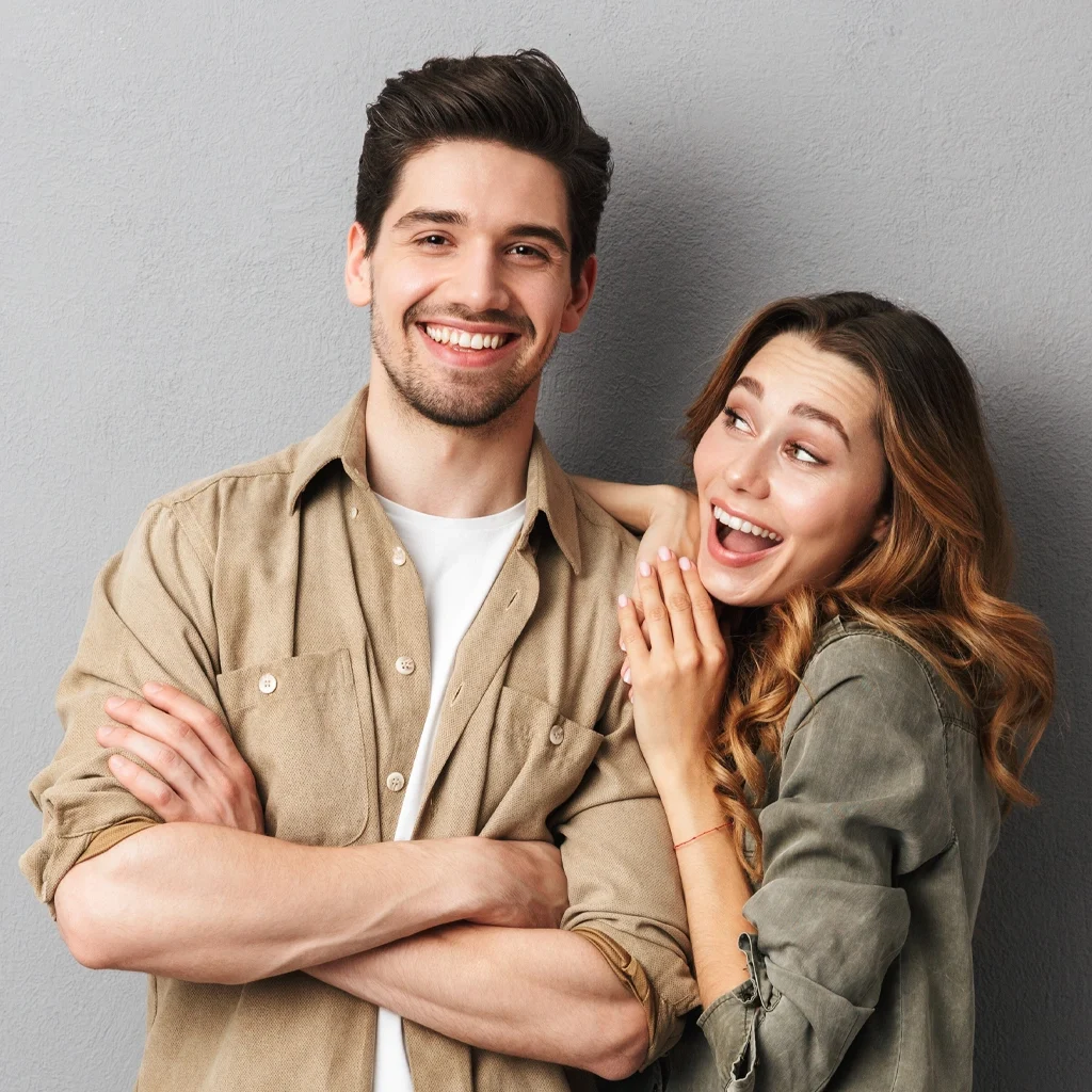 Portrait of a cheerful young couple standing together
